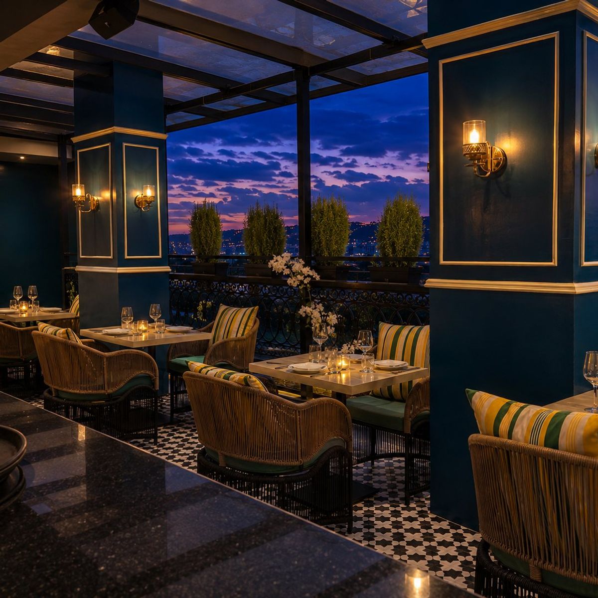 Long dining tables on the Levitate rooftop at dusk