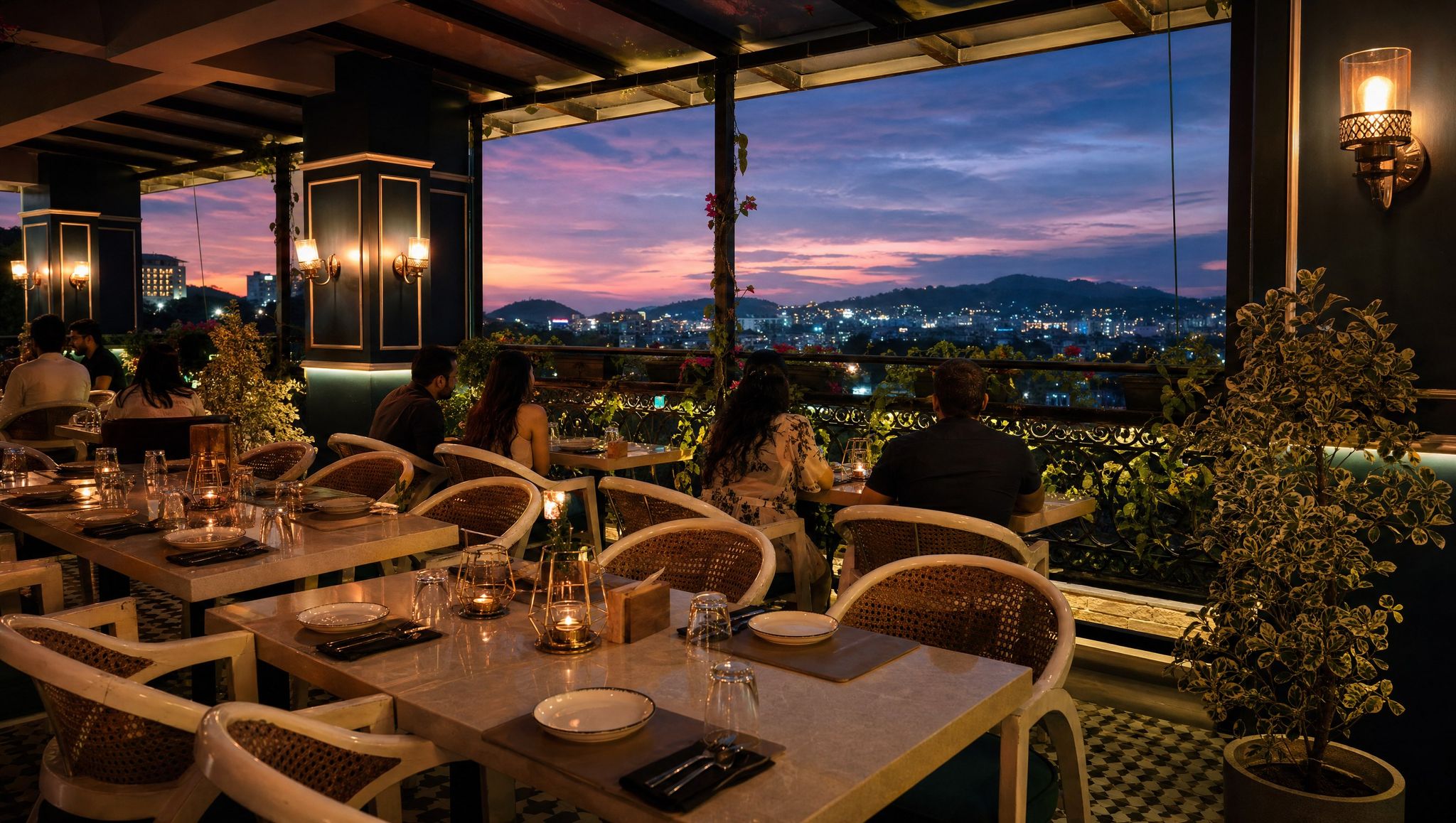 Levitate's open-air rooftop at dusk, the Guwahati skyline lit below