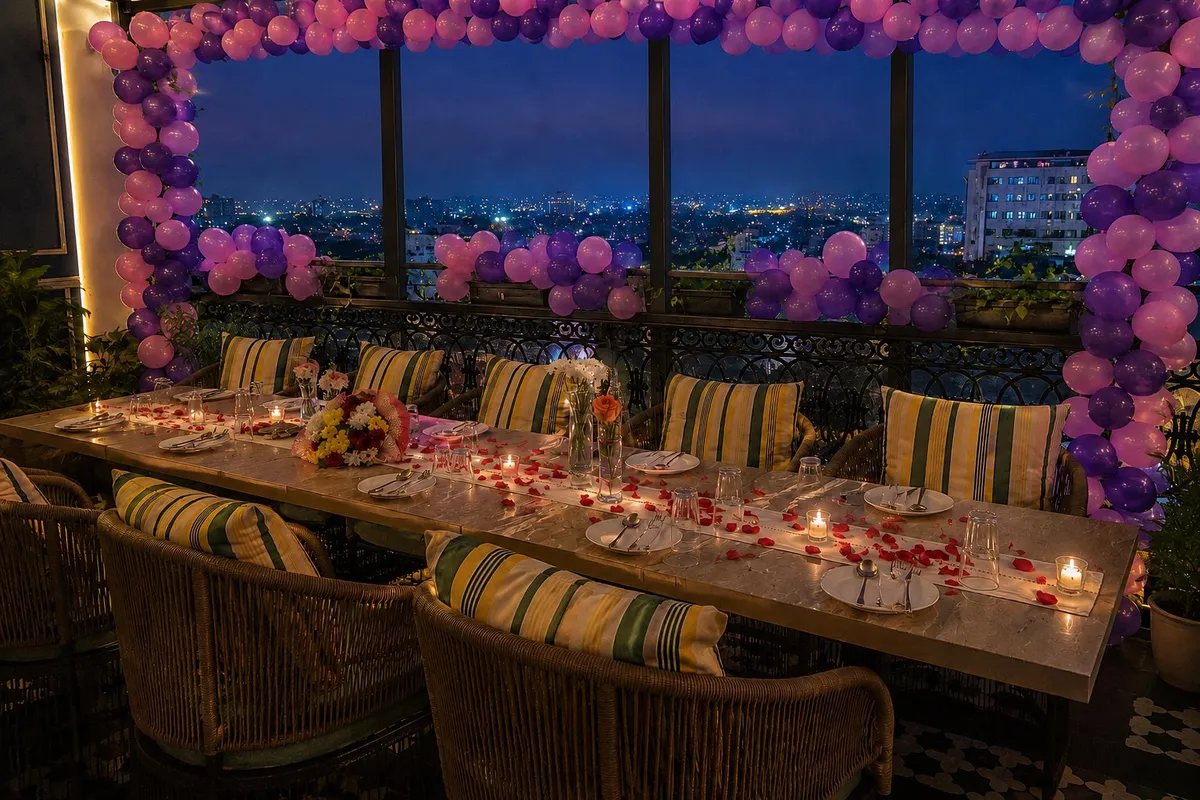 Premium décor — balloon canopy over the table, city beyond