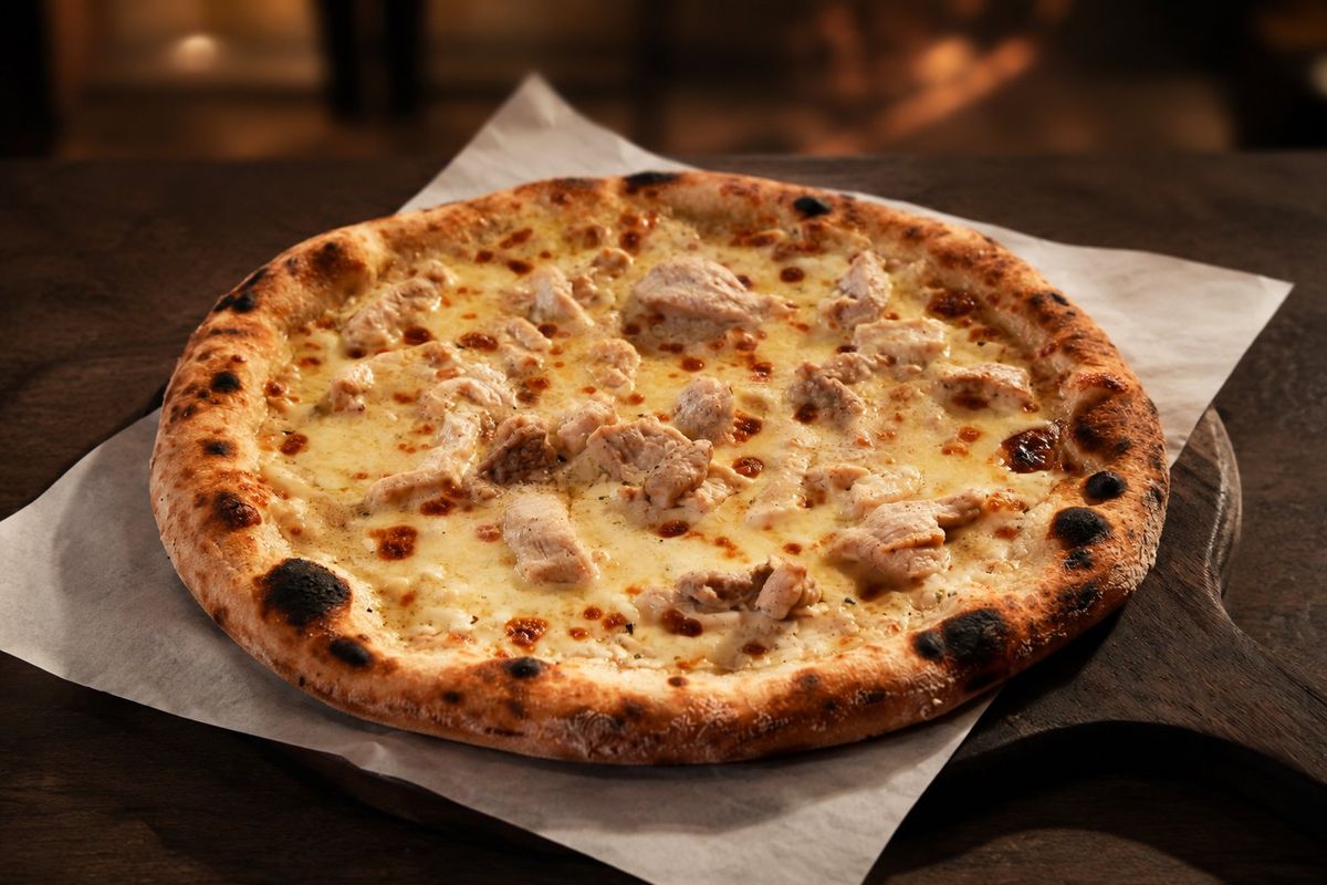 White Garlic Chicken Pizza — plated at Levitate